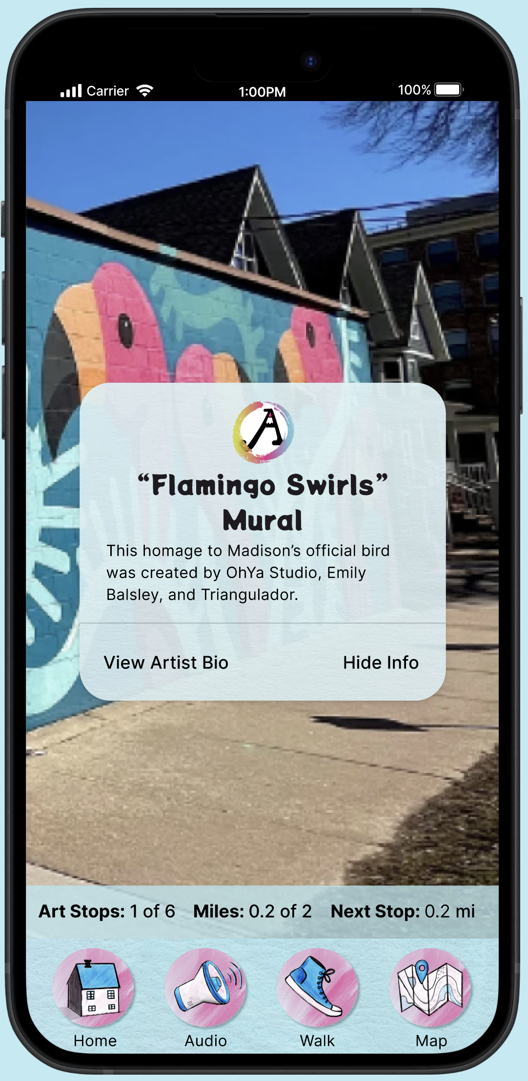 a pink and turquoise mural of flamingos viewed on a phone with a dialogue box showing information about the mural